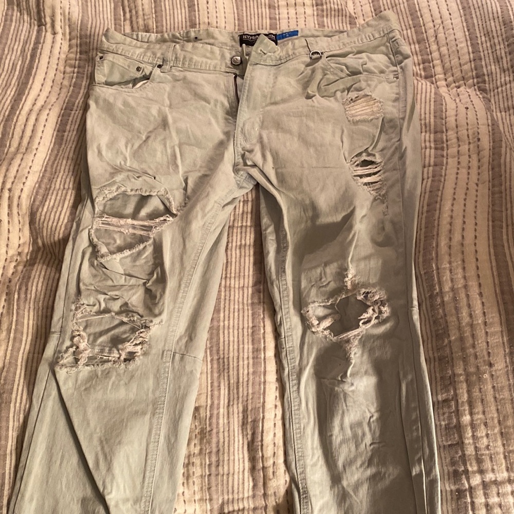 Selling a pair of Hyper Denim slim fit jeans with zippers on the ankles. Size 36